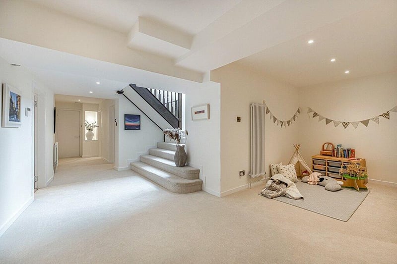 The staircase from the ground floor - the property is set over three levels
