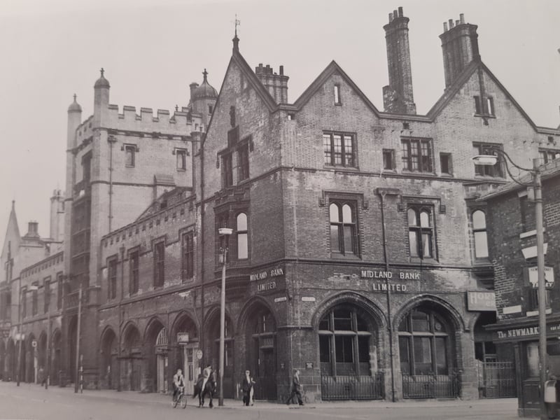 The Corn Exchange, at the corner of Sheaf Street and Broad Street, was destroyed by fire in 1947. The shell of the building, seen here in 1961, was eventually demolished for the laying out of Park Square roundabout