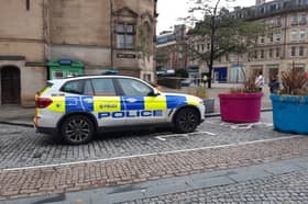 Police at the scene of the incident where a boy aged 14 was wounded on Tuesday. A man aged 48 has been arrested on suspicion of attempted murder. Picture: David Kessen, National World
