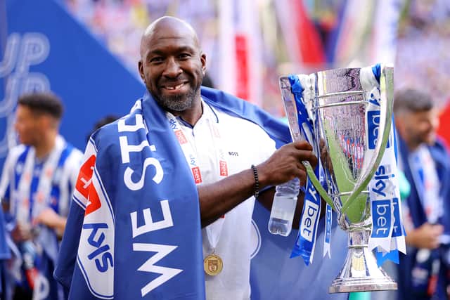 Darren Moore celebrating a League One playoff final win for Sheffield Wednesday 