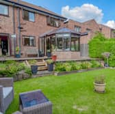 The garden of the four-bedroom house on Hillcote Close, Sheffield, which is being marketed by Yopa