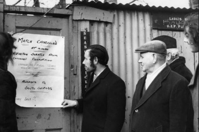 Some of the supporters who turned up at Simonside Hall for the South Shields v Alfreton game are reading the notice that the match had been called off because Alfreton couldn’t raise a team. Remember this from 1973? Photo: Shields Gazette