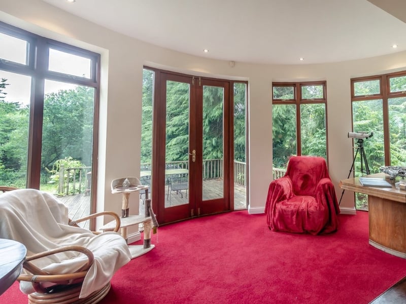 On the lower ground floor, this study leads out on the private garden. (Photo courtesy of Fine & Country)