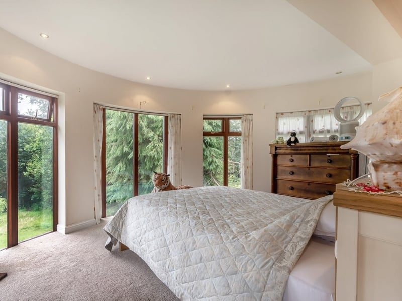 The positioning of the master bedroom means you can wake up to sweeping views of the hills outside. (Photo courtesy of Fine & Country)
