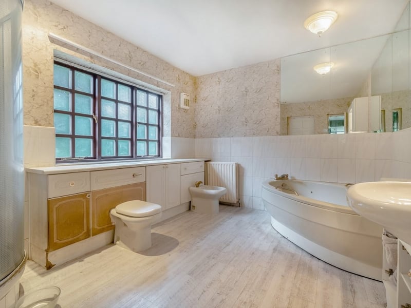 This family bathroom is located on the ground floor. (Photo courtesy of Fine & Country)