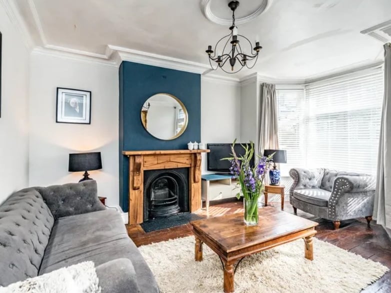 The "super spacious" accommodation is said to have "retained and blended" original features with a "contemporary twist". (Photo courtesy of Whitehornes Estate Agents)