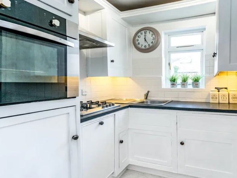 The off-shot kitchen is found to the rear, just beyond the dining room. (Photo courtesy of Whitehornes Estate Agents)