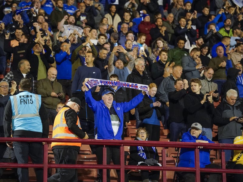 A wide-angle shot of Pompey fans chanting against Barnsley