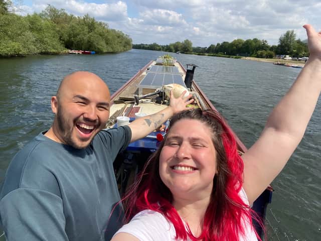 Amy and Wes quit the "rat race" to live permanently on the water in their narrowboat. (Photo courtesy of SWNS)