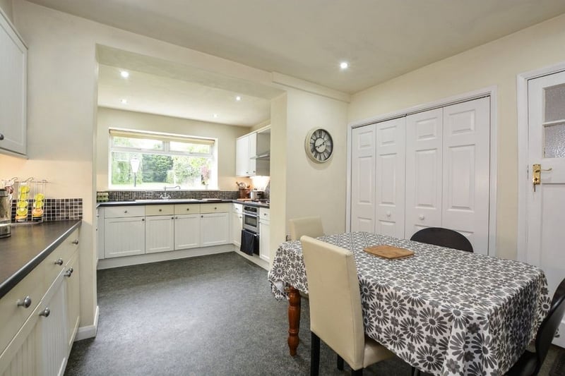 From the hallway you access the kitchen with this large breakfast area.