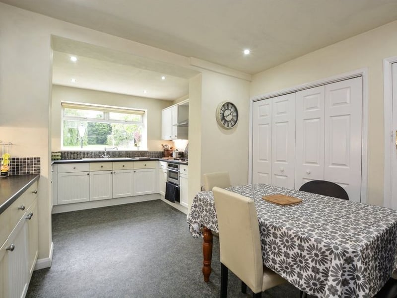 From the hallway you access the kitchen with this large breakfast area.