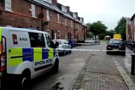 The scene on Cromford Street as police investigated the murder of  Saira Ali