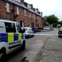 The scene on Cromford Street as police investigated the murder of  Saira Ali