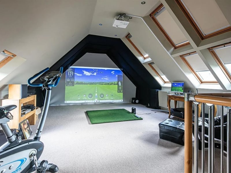 This "loft bedroom" is currently used as an extra reception area, currently housing a golf practice simulator - which ELR have stated "may be available via separate negotiation". (Photo courtesy of Eadon Lockwood & Riddle)