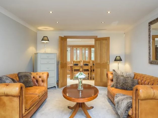 This bright lounge is found to the front of the property, to the left of the grand entrance hall. (Photo courtesy of Whitehornes Estate Agents)
