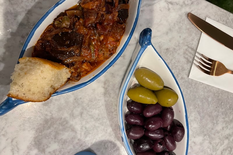 Appetisers: Caponata - slow cooked sweet and sour aubergines, celery, olives, capers and tomatoes & mixed olives 