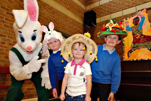 The Asda bunny has lots of admiration for the Easter bonnets worn by Linzi Saunders, Jessica Little and Raymond Monks in 2004.