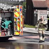 South Yorkshire fire fighters rescued two people from a house on Norfolk Road, Great Houghton, Barnsley. File picture shows South Yorkshire firefighters in action. Picture: David Kessen, National World
