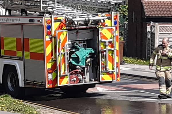 South Yorkshire fire fighters rescued two people from a house on Norfolk Road, Great Houghton, Barnsley. File picture shows South Yorkshire firefighters in action. Picture: David Kessen, National World