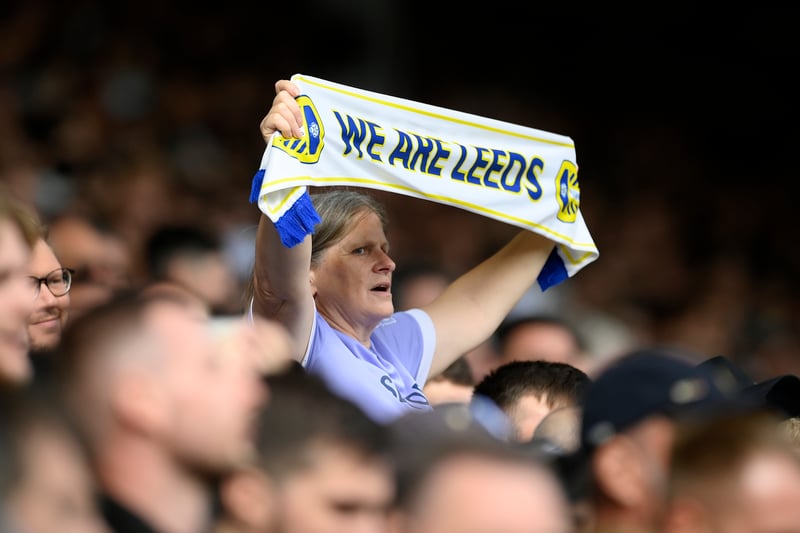 A Leeds United fan holding scarf ahead of kick off.