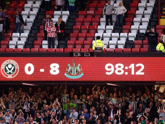 A general view of the scoreboard showing 0 - 8 as Newcastle United fans celebrate following the Premier League match between Sheffield United and Newcastle United at Bramall Lane on September 24, 2023 in Sheffield, England. (Photo by George Wood/Getty Images)