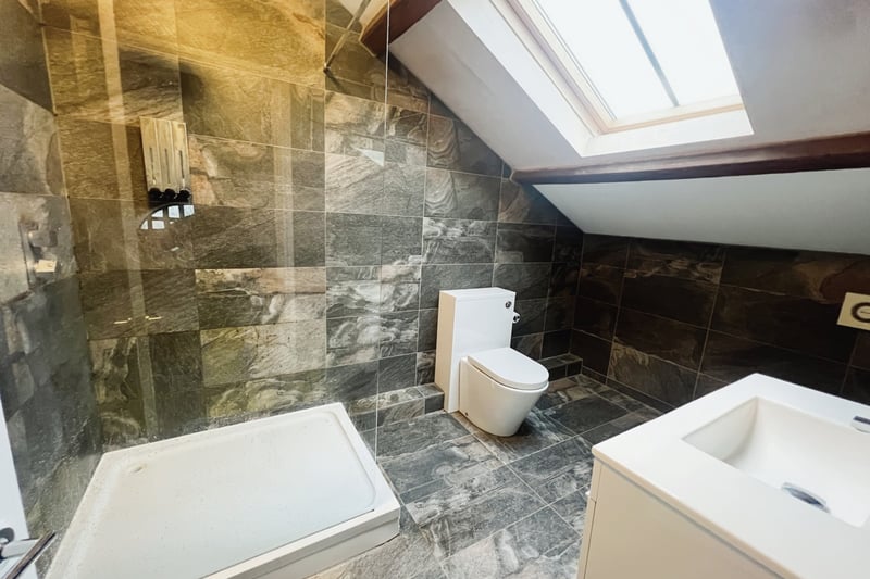This bedroom also has a fully tiled ensuite comprising a walk in shower, WC and wash hand basin.