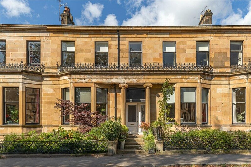 The front of the property on Westbourne Gardens with sandstone pillars to either side of the entrance vestibule which has panelled storm doors.