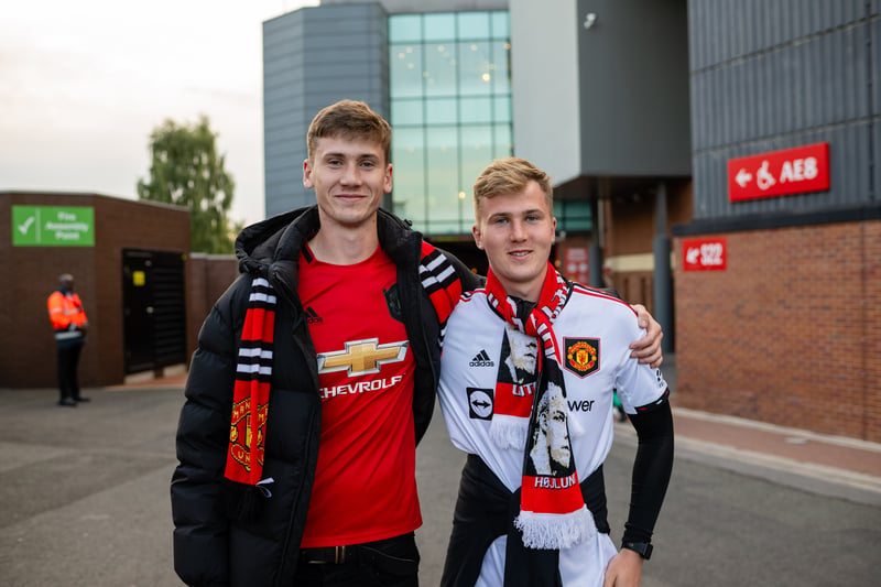 Manchester United fans arrive ahead of the Carabao Cup Third Round match between Manchester United and Crystal Palace