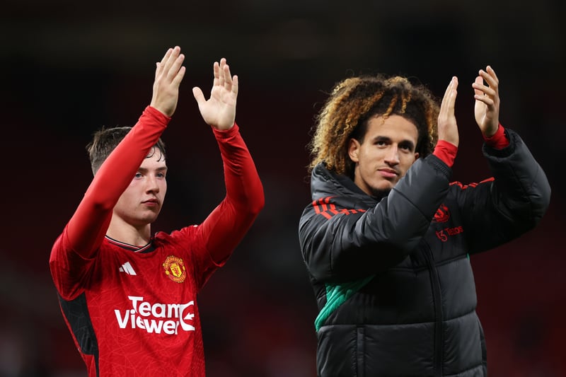 Daniel Gore and Hannibal Mejbri of Manchester United applaud the fans