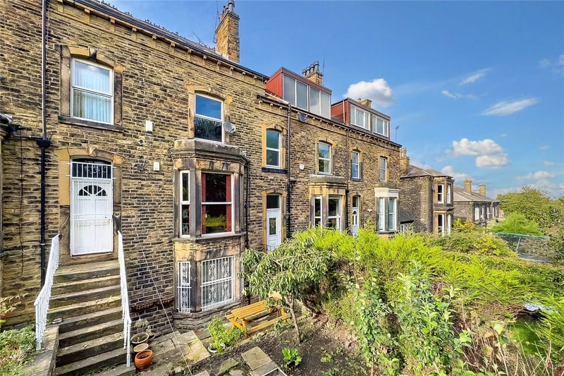 To the front of the terraced house is a small garden.