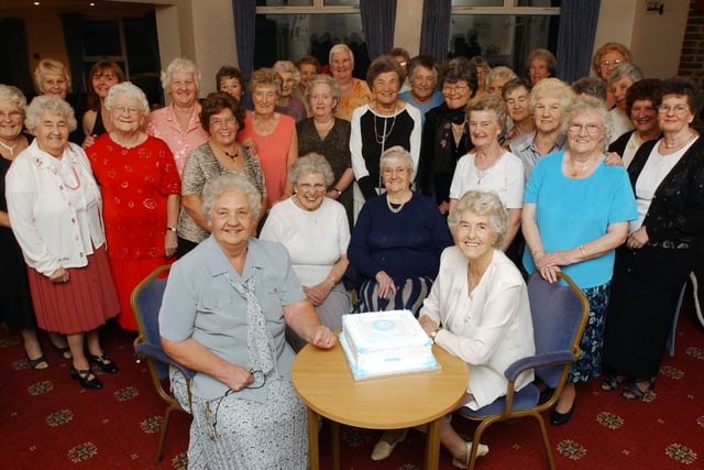 Philadelphia Ladies Club celebrating their group's 45th birthday with a party in 2003.