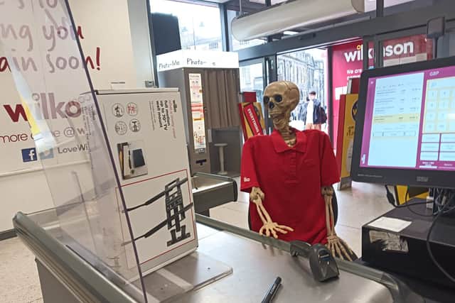 The staff at Wilko in Castlegate, Sheffield, are facing the loss of the retailer with some good humour - as this photo of a skeleton in the cashier's chair shows.