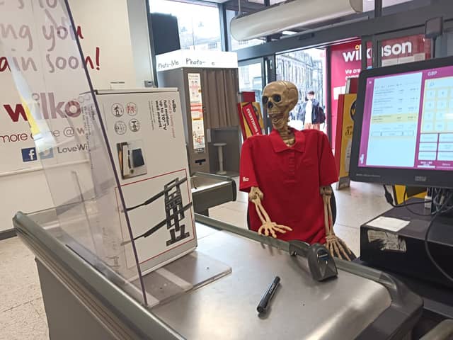 The staff at Wilko in Castlegate, Sheffield, are facing the loss of the retailer with some good humour - as this photo of a skeleton in the cashier's chair shows.