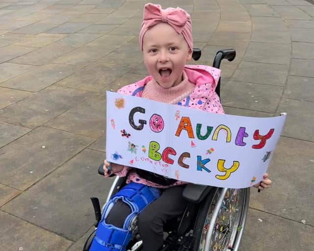 Five-year-old Neiva was her aunty's top supporter as she took on the Sheffield 10K race. 