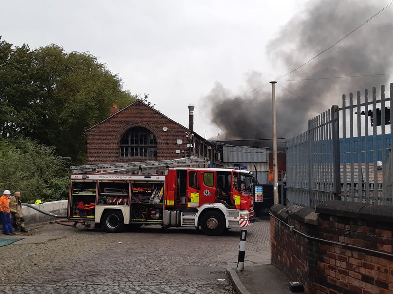 Firefighters at an industrial fire on Penistone Road, Sheffield. Picture: David Kessen, National World
