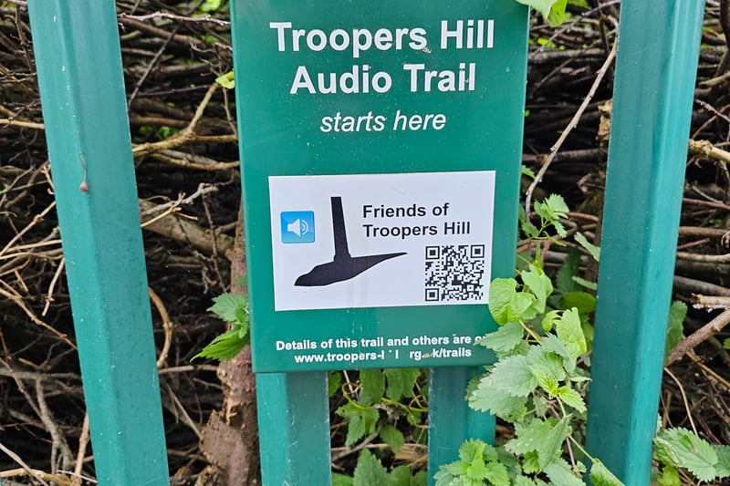 Visitors can access the audio trail of Troopers Hill that was made by Friends of Troopers Hill through the QR code found near the top of the hill where the chimney is.