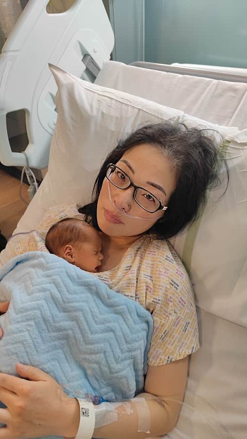 Li Li with her newborn, in October 2022.