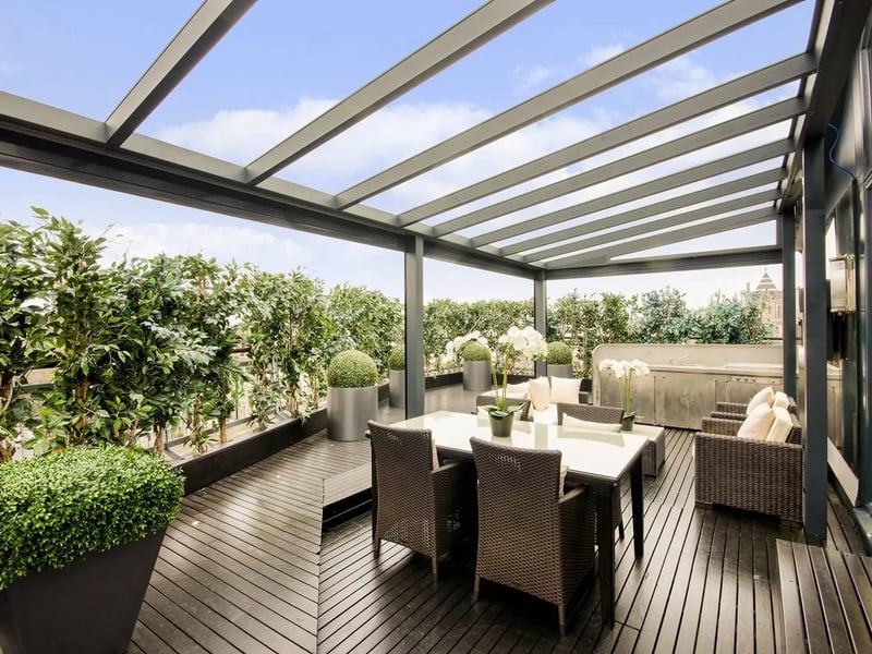 A covered dining area on the decadent balcony 