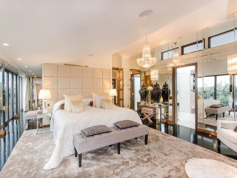 Bedroom 1 inside the property boasts a spacious open-plan design