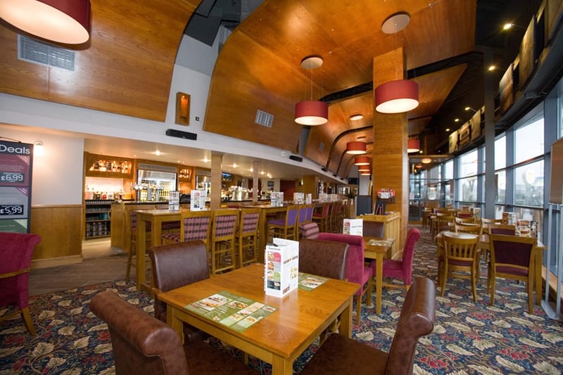 “Large, purpose-built, lively Wetherspoon pub at the XSite
Leisure Complex, with its cinema, crazy golf, rock
climbing and much more. Throughout the pub the walls
display photographs depicting the history of industry on
the River Clyde.” Unit 21 Xscape, Kings Inch Road. 