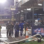 Sheffield Tigers riders celebrate in the rain at Owlerton after securing their place in the Sports Insure Speedway Premiership grand final. Picture: David Kessen, National World