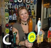 Pictured behind the bar at the Robin Hood pub, on Greaves Lane, Stannington, Sheffield, in 2006 is the landlady Keeley Ayres