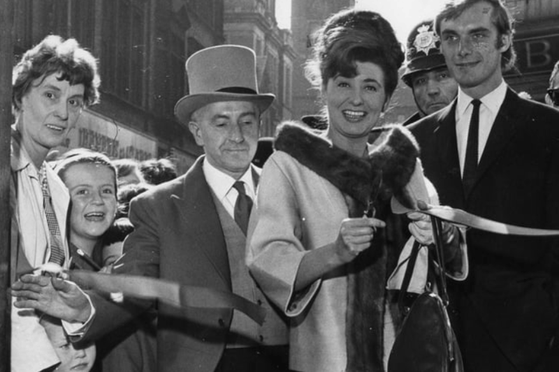 Actress Pat Phoenix, also known as Elsie Tanner of Coronation Street, cuts the tape to officially open Top Clothing Store in King Street. With her is actor Roger Adamson, who also appeared in Coronation Street. This one takes us back to 1964. Photo: Shields Gazette