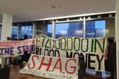 Balaclava donning student activists have occupied the Arts Tower to protest at The University of Sheffield's links with the Arms Trade. (Photo courtesy of @sheffaction)