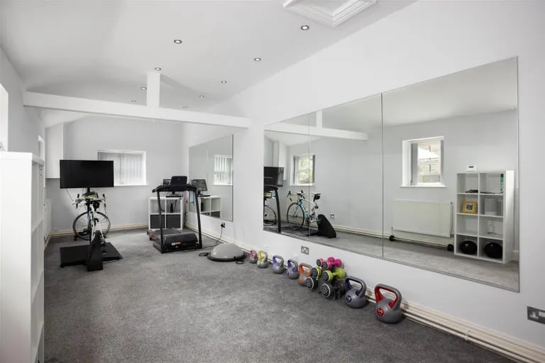 In the annexe building is a large private gym.