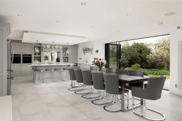 The heart of the property is this stunning open dining kitchen and living area.