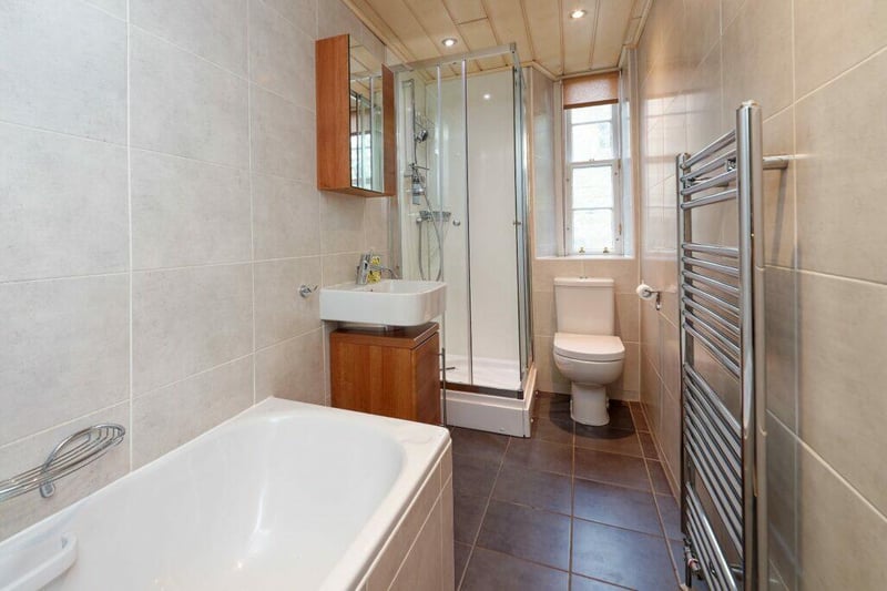 Contemporary family bathroom with bath and separate shower.