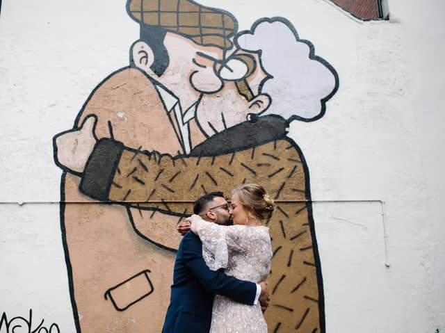 Charlotte and Imran Khan are just two of the "hundreds" of people to recreate Pete McKee's The Snog.