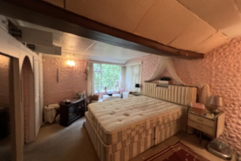 This bedroom benefits from beautiful views of the property, which occupies a woodland site of just over half an acre. Pictures courtesy of Mark Jenkinson estate agents 