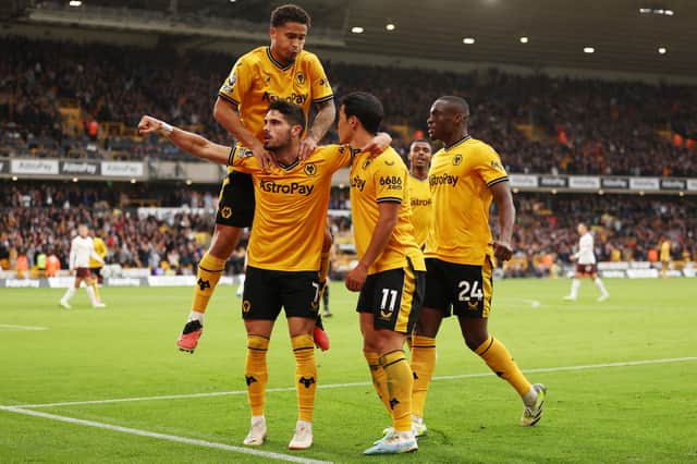 Wolves players celebrate during their victory 